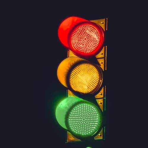 photograph of traffic light at night